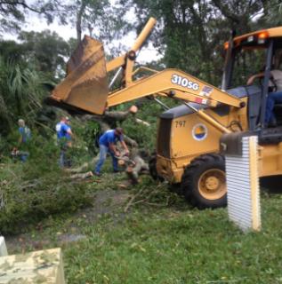 Public Works with backhoe